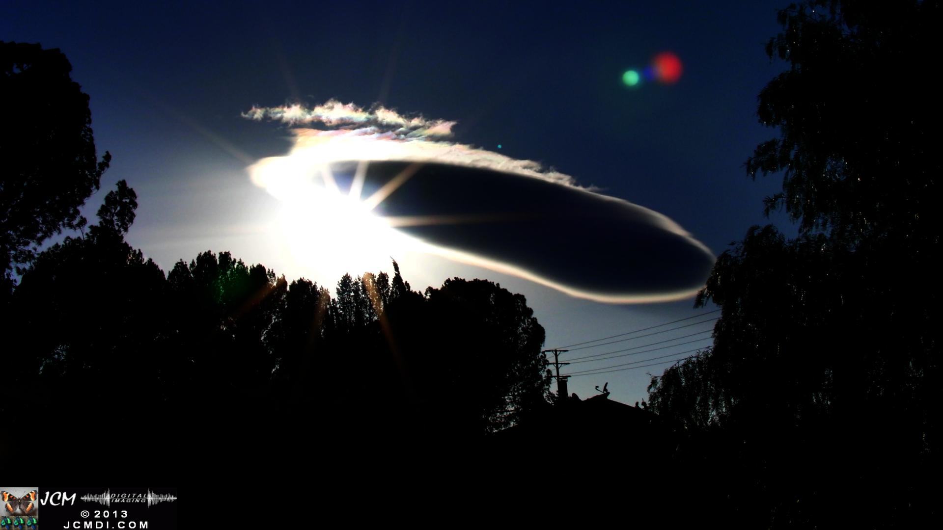 3-9-2010 Spectacular UFO lenticular Cloud and sunset stills with rainbow ice crystals
